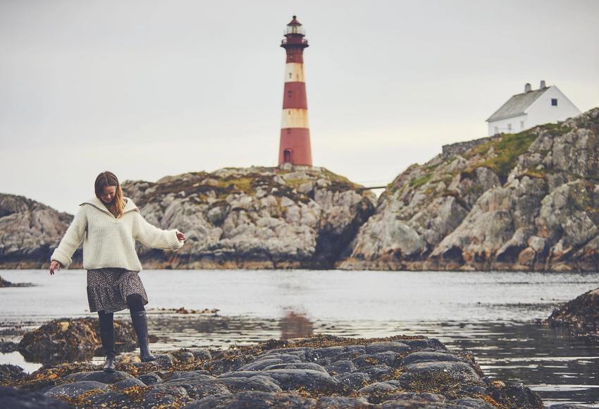 Women in front of lighthouse on Fedje Island