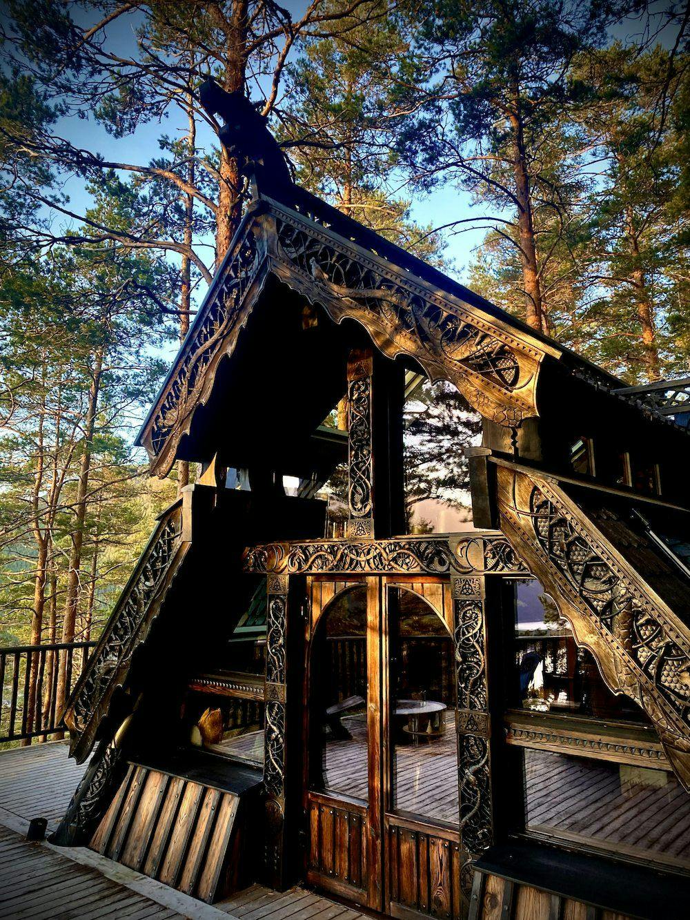 Nordic cabin with wooden carvings