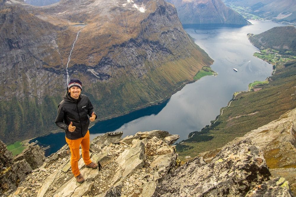 Man overlooking the norwegian fjords