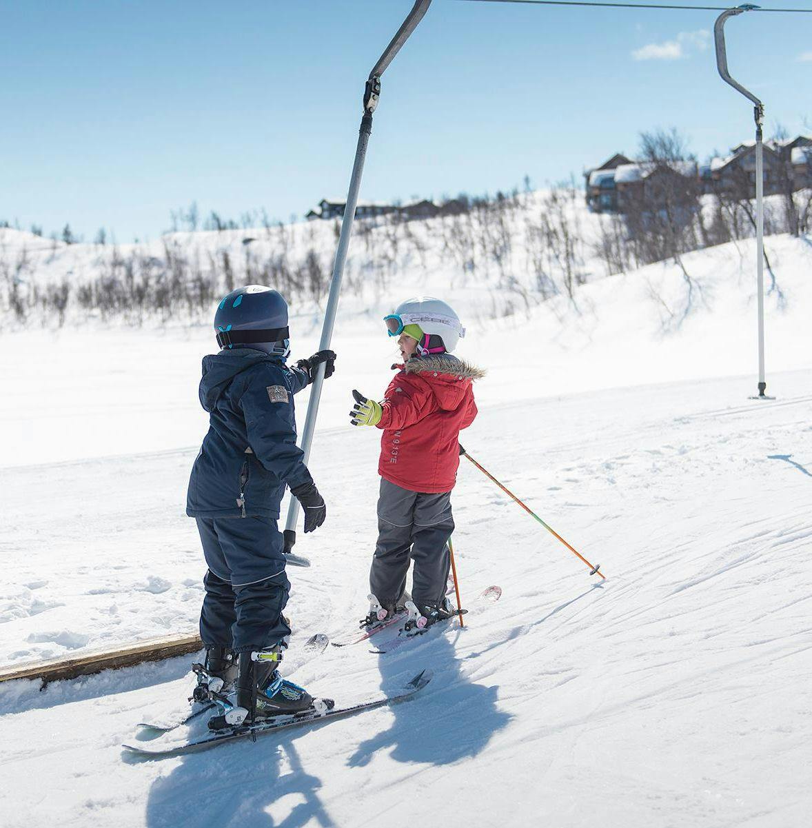 Kids with slalom skis